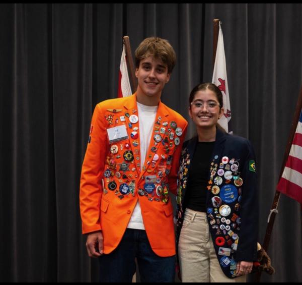 Main article image for story titled 'Youth Exchange Students Share Their Stories at District Conference'